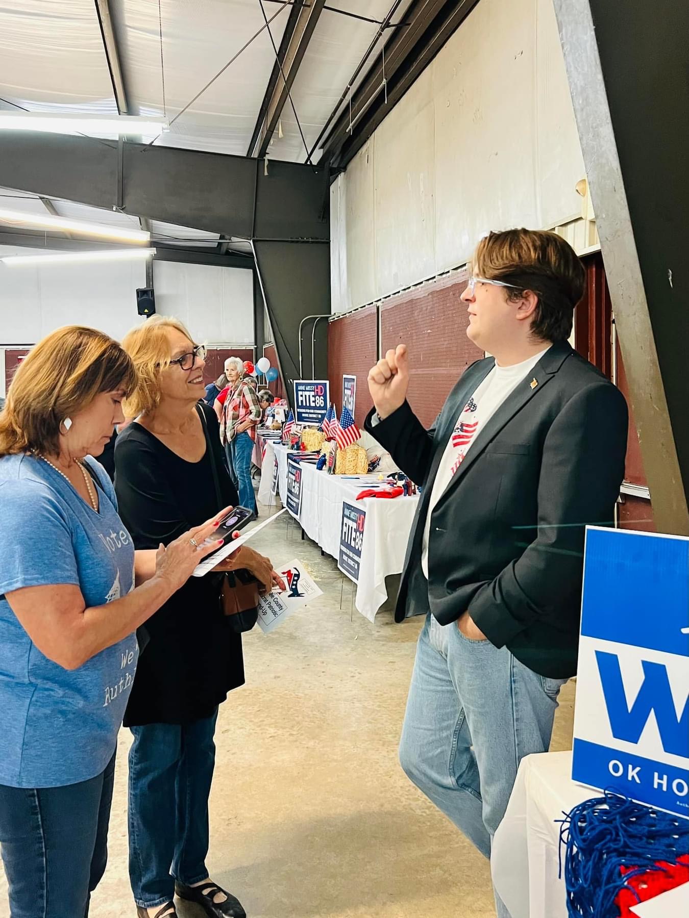 Christopher Wier speaking with voters at a campaign event